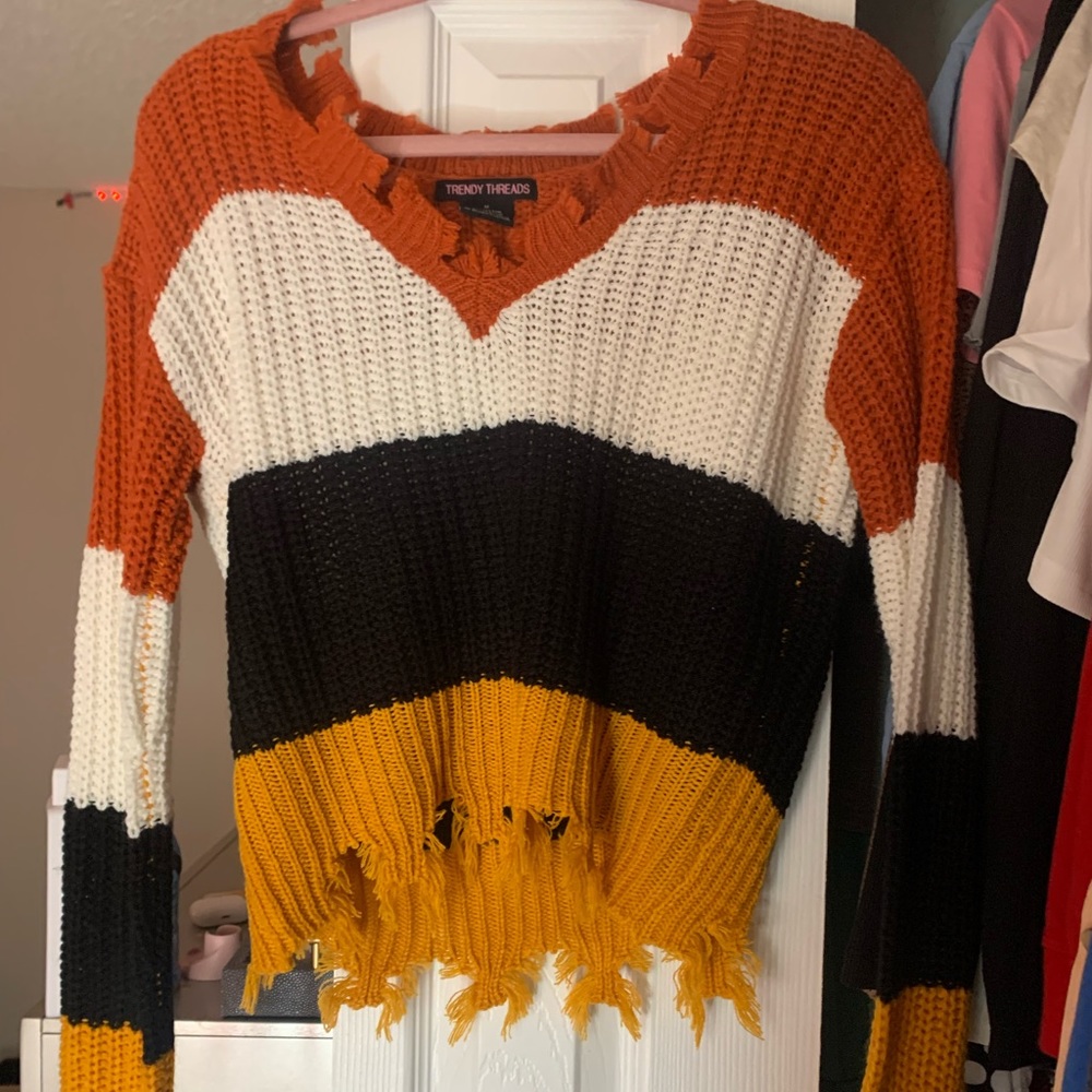 Distressed long sleeve sweater